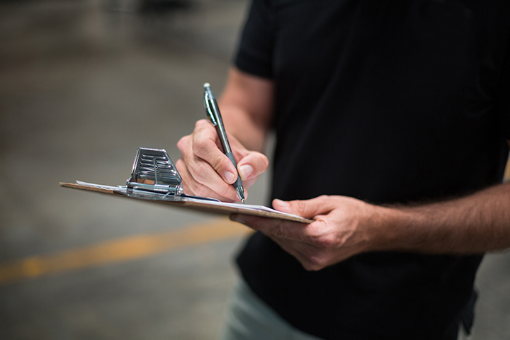 Inspector with a clipboard